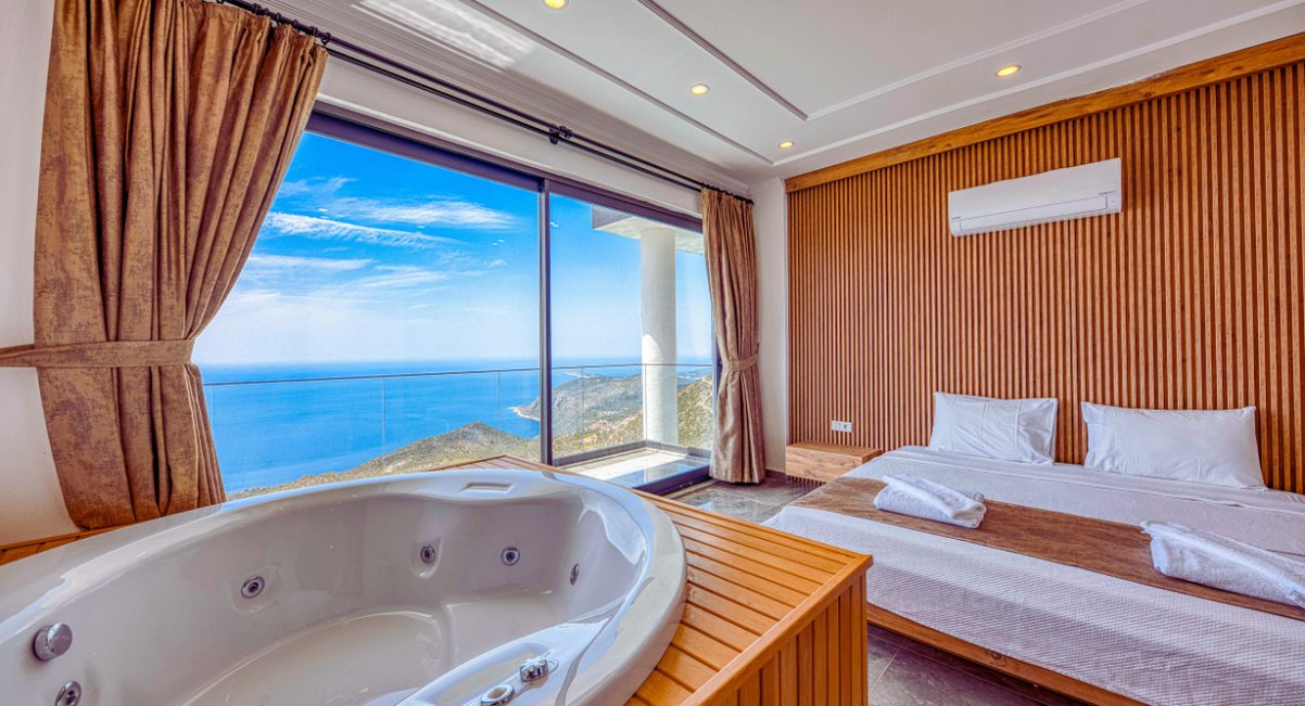 Chambre romantique avec jacuzzi privatif et vue panoramique sur la mer